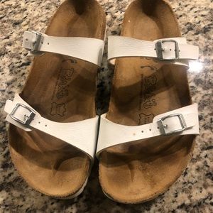 Great pair of used white Birkenstock!